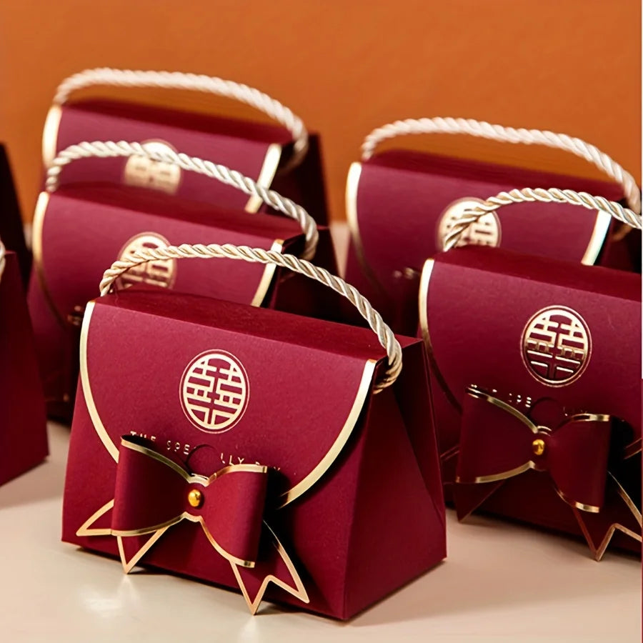 12Pcs Wine Red Handbag Candy Boxes – Elegant Wedding Favor Gift Packaging with Bow & Chinese “Double Happiness” Design